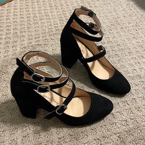 Black strap pumps